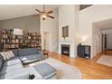 Spacious living room with hardwood floors and a fireplace at 2975 Thunder Lake Cir, Lafayette, CO 80026