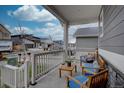 Inviting front porch featuring comfortable seating, offering a cozy outdoor space at 1031 Turnberry Cir, Louisville, CO 80027