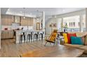Spacious open concept home with eat-in kitchen, dining, and living area and modern decor at 4537 N Tennyson St # 101, Denver, CO 80212