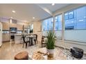 Spacious living area with open kitchen, natural light, and contemporary design at 3256 Federal Blvd, Denver, CO 80211