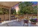 Outdoor patio space featuring a table and grill, ideal for outdoor dining at 1152 S Yosemite Way # 29, Denver, CO 80247