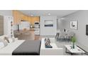 Comfortable living space seamlessly connects the bedroom area and the kitchen, perfect for modern living at 2500 S York St # 310, Denver, CO 80210