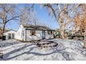 House exterior showcasing a renovated front facade and landscaping at 4745 S Sherman St, Englewood, CO 80113