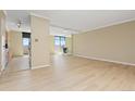 Open floorplan featuring modern flooring, fireplace and balcony access at 2880 S Locust St # 708S, Denver, CO 80222