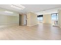Spacious living room with neutral paint and plenty of natural light at 2880 S Locust St # 708S, Denver, CO 80222