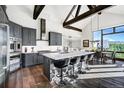 Gourmet kitchen with island seating and stainless steel appliances at 52 West Point Lode # A, Breckenridge, CO 80424