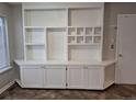 Spacious and bright built-in shelving unit that provides generous storage and display options at 2238 S Nile Ct, Aurora, CO 80014