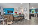 The dining area flows between the living room and kitchen, perfect for entertaining Gathering and friends at 1390 W 78Th Cir, Denver, CO 80221