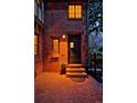 Inviting front entrance featuring a classic brick facade and elegant door with decorative window at 239 Ash St, Denver, CO 80220