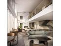 Beautiful building lobby featuring a fireplace, comfortable seating and stylish modern decor at 525 18Th St # 3209, Denver, CO 80202