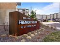 Close-up of Fremont Place sign with attractive landscaping at Littleton Village at 400 E Fremont Pl # 205, Littleton, CO 80122