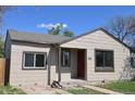 Inviting single-story home with a covered porch and tidy front yard, perfect for a starter home at 1750 Jamaica St, Aurora, CO 80010