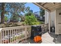 Private patio with covered area, grill, and storage at 12655 E Pacific Cir # E, Aurora, CO 80014