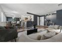 Bright living room with sleek furniture, dining area, and modern decor at 525 Jackson St # 304, Denver, CO 80206