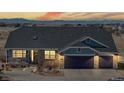 Charming single-Gathering home with a three-car garage at dusk at 14701 Yosemite St, Brighton, CO 80602