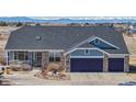 Charming ranch-style home with a three-car garage, brick accents, and inviting front porch at 14701 Yosemite St, Brighton, CO 80602