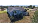 This beautiful home includes a raised rear deck, walkout basement, and a spacious backyard surrounded by mature trees at 14701 Yosemite St, Brighton, CO 80602
