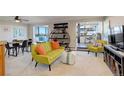 Open-concept living room with stylish furnishings and plenty of natural light at 3131 E Alameda Ave # 1003, Denver, CO 80209