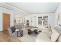 Bright living room with modern decor and ample natural light, perfect for entertaining and relaxing at 2019 S Fox St, Denver, CO 80223