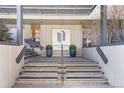 A building entrance has stairs leading up to a sign that reads Governors Park at 777 N Washington St # 204, Denver, CO 80203