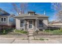 Charming single-story house with a classic design, fenced yard and mature trees at 2819 W 43Rd Ave, Denver, CO 80211