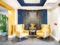 Inviting lobby area with comfortable seating, stylish decor, and a cozy fireplace feature at 300 W 11Th Ave # 6G, Denver, CO 80204