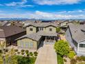 Aerial view of a lovely home, nestled in a neighborhood with beautiful mountain views at 525 Grenville Cir, Erie, CO 80516