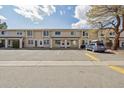 A sunny day view of the exterior of Kings Mill featuring parking and easy access at 8915 Field St # 118, Broomfield, CO 80021