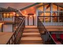 Inviting front entrance features a railed stairwell and a white door at 37 High View Ln, Boulder, CO 80302