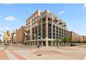 Beautiful brick building exterior showing glass features, balconies, and street views in a well-maintained neighborhood at 1890 Wynkoop St # 806, Denver, CO 80202