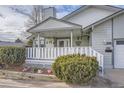 House exterior showcasing front porch details and landscaping at 19 Carla Way, Broomfield, CO 80020