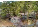 Mountain home nestled among tall pine trees offering seclusion and beautiful natural surroundings at 1608 Beaver Brook Canyon Rd, Evergreen, CO 80439