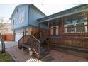 Charming home featuring a covered front porch with steps and brick accents at 6720 W 112Th Pl, Westminster, CO 80020