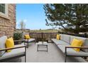 Relaxing outdoor patio space with cozy seating, perfect for enjoying the scenic views and sunshine at 1761 S Buchanan Cir, Aurora, CO 80018
