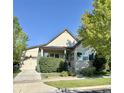 Beautiful single-story home with a front-facing garage, manicured lawn, mature landscaping, and charming curb appeal at 19 S 45Th Ave, Brighton, CO 80601