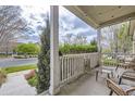 Relaxing covered front porch with plenty of room to sit and enjoy the outdoors at 19 S 45Th Ave, Brighton, CO 80601