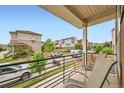 View from the covered porch, showcasing the neighborhood and street at 2592 Sweet Wind Ave, Castle Rock, CO 80109