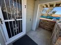 Entryway features security door, brick facade and covered entryway at 992 S Dearborn Way # 7, Aurora, CO 80012