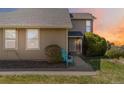 Charming home exterior featuring a well-maintained lawn, mature landscaping, and inviting curb appeal at 2645 S Xanadu Way # D, Aurora, CO 80014