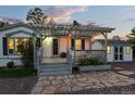 Charming home with a welcoming pergola-covered patio, perfect for relaxing evenings at 652 Verdos Dr, Elizabeth, CO 80107