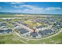 Aerial view of a community featuring well-maintained homes, green spaces, and scenic views at 547 Scrubjay Cir, Castle Rock, CO 80104