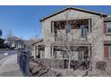 A townhome with an outdoor patio showcases a private outdoor space, perfect for relaxing and enjoying the scenery at 10588 Parkington Ln # 39A, Highlands Ranch, CO 80126