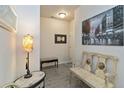 Inviting foyer with decorative bench, table, and artwork creating a warm welcome at 1640 Aspen Meadows Cir, Federal Heights, CO 80260