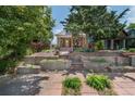 Charming house with stone stairs and garden with retaining wall at 3182 W 29Th Ave, Denver, CO 80211
