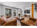 Comfortable living room with patio access and a view at 112 Illinois Gulch Rd # 6, Breckenridge, CO 80424