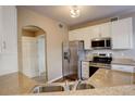 Modern kitchen with stainless steel appliances at 17497 Nature Walk Trl # 101, Parker, CO 80134