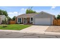 Lovely single-Gathering home boasting a well-maintained lawn and an attached two-car garage at 11323 Albion St, Thornton, CO 80233