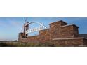 Sky Ranch community sign featuring stone accents and modern metal details at 712 N Bently St, Watkins, CO 80137