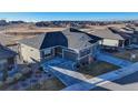 Charming single-Gathering home with an attached two-car garage, complemented by a well-maintained front yard at 12668 Ulster St, Thornton, CO 80602