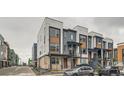Contemporary townhome showcases modern design with stone and siding details in a residential community at 2545 Josephine Way, Superior, CO 80027